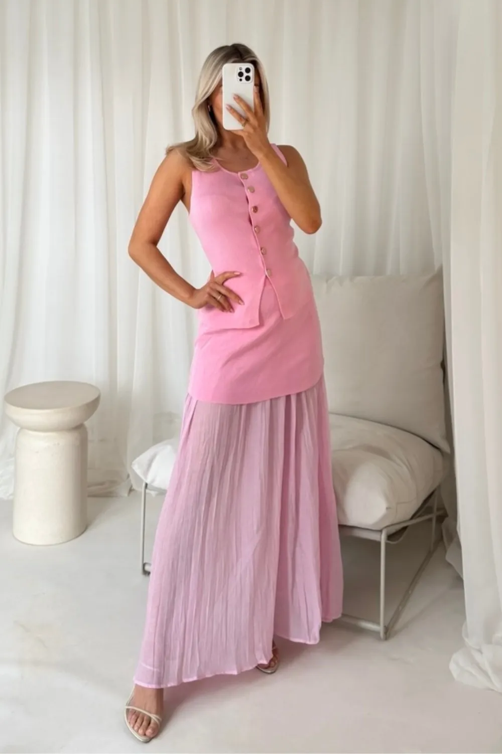 Delilah pink knit waistcoat & pleated sheer maxi skirt