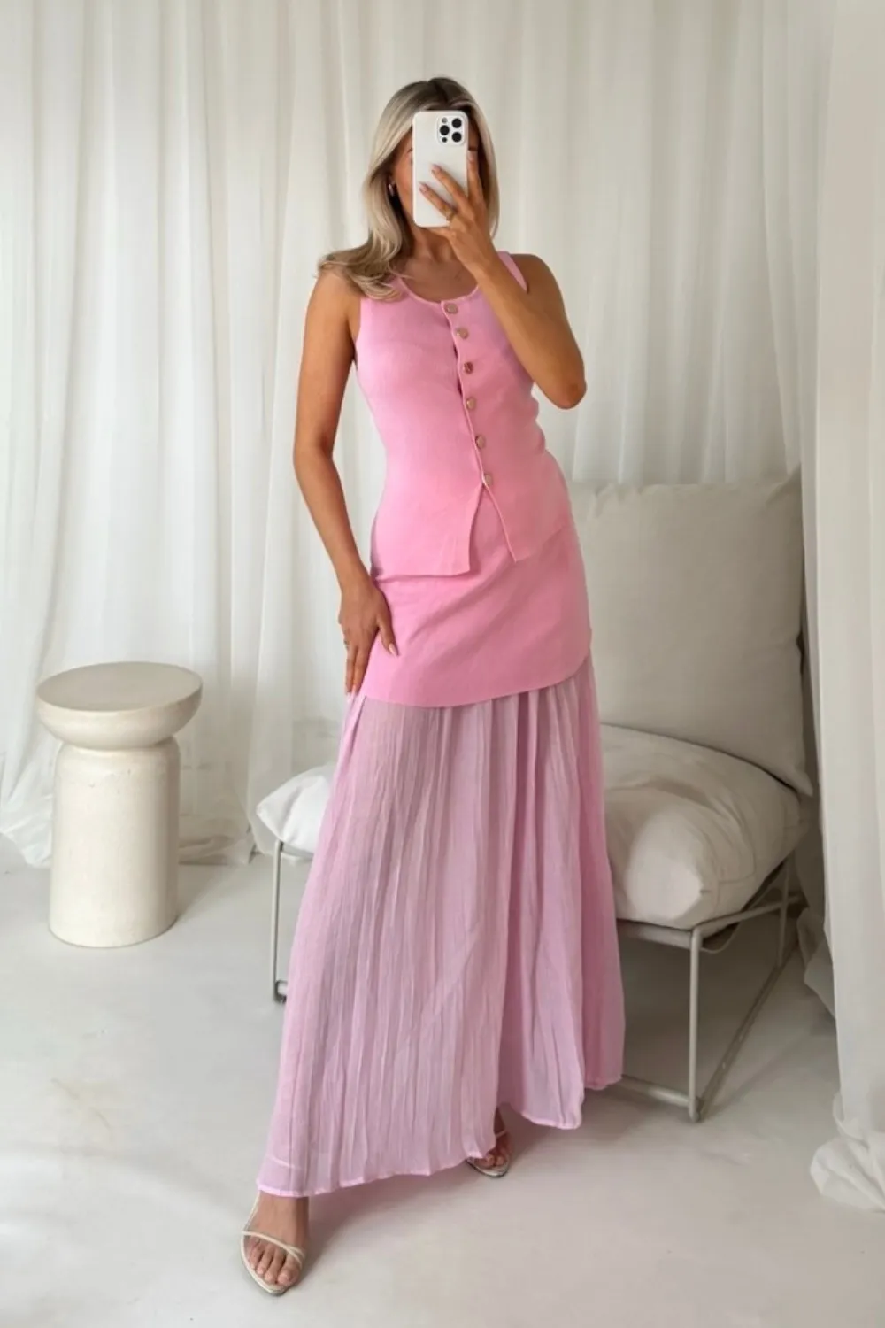 Delilah pink knit waistcoat & pleated sheer maxi skirt