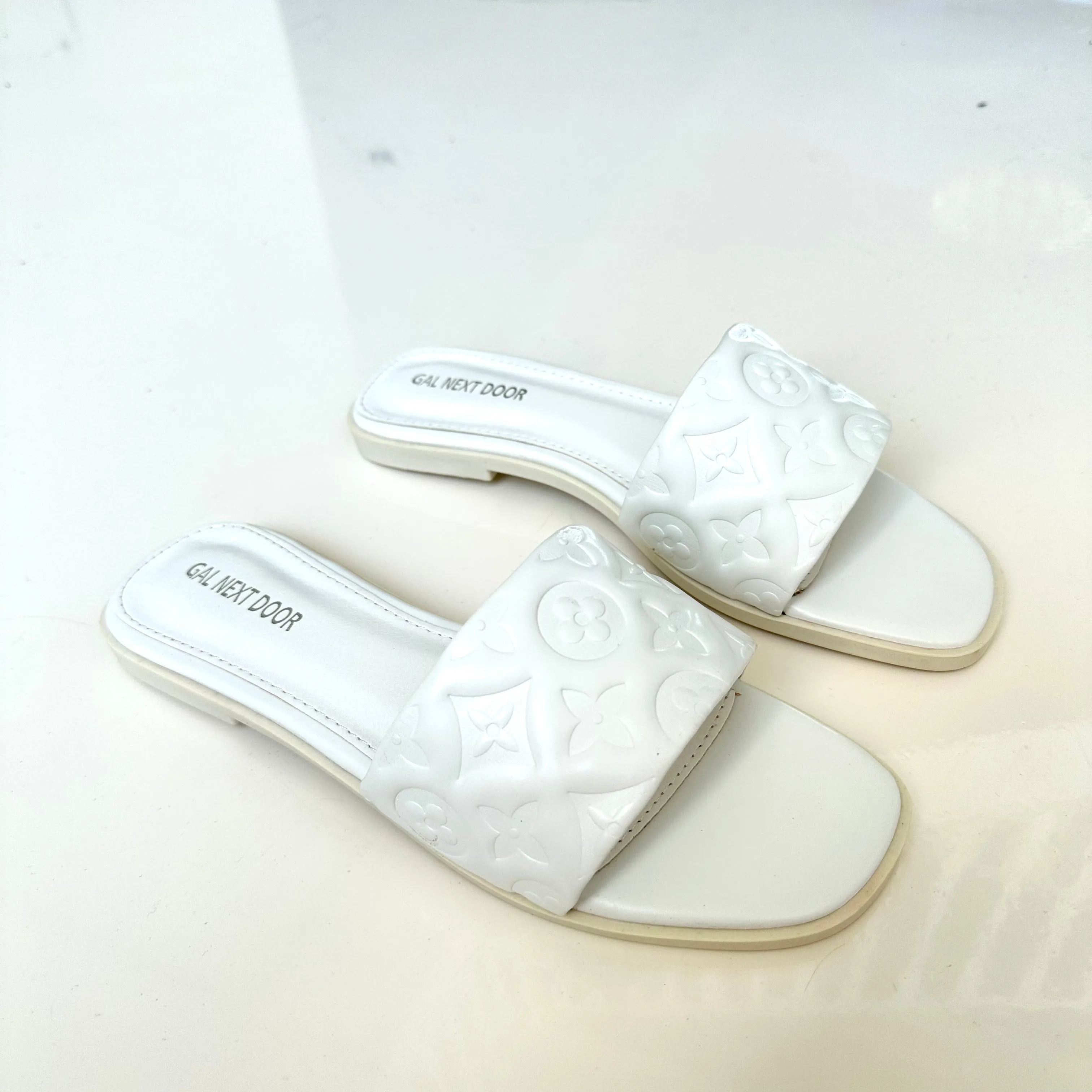 Jumeirah- White Floral Embossed Sandals