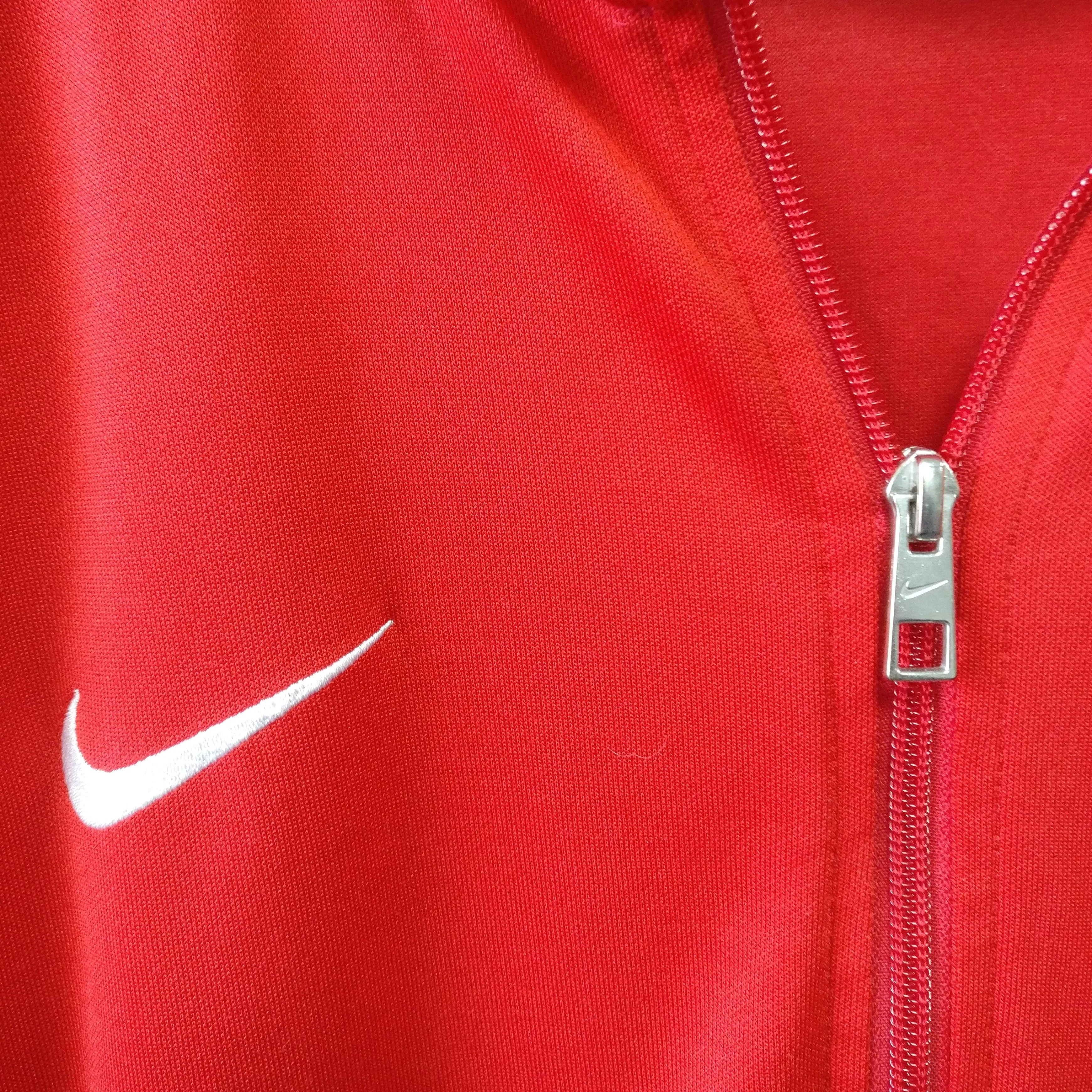 Nike swoosh red tracksuit top. L